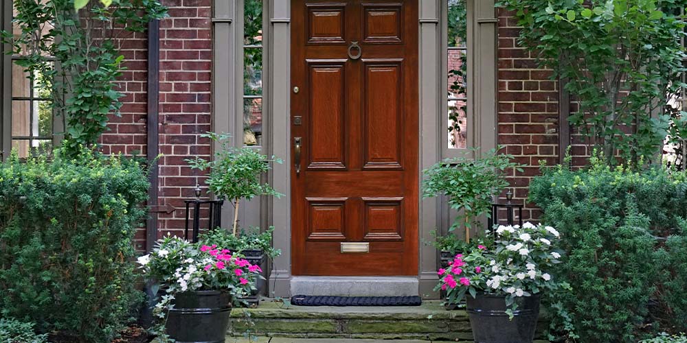 Primex Garden Center -How to Boost Your Homes Curb Appeal in Pennsylvania-- matching outdoor planters to flank the front door